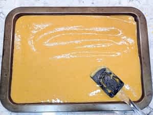 rociar la masa en el molde